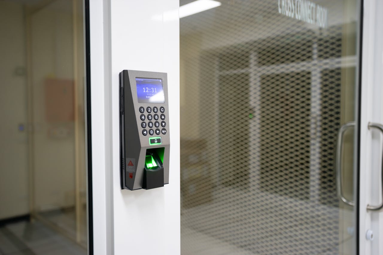 A modern fingerprint scanner for secure access control in an office environment.